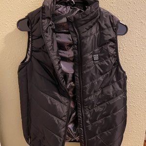 Black puffer vest with heat ability size small